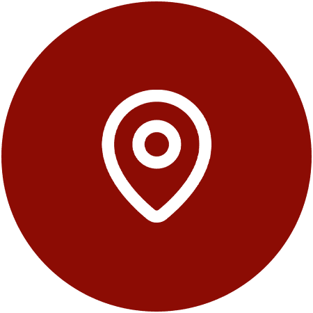 White map pin icon on a red circular background.